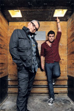 Jon Farris (left) of INXS stands with Dan Sultan who performs the INXS hit <em>Just Keep Walking</em> for the group's latest album.