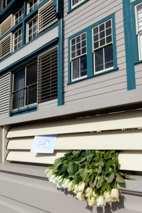 Flowers left outside Charlotte Dawson's Woolloomooloo apartment.