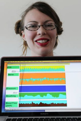 Audio artist Erin Marie Gee of Canada displays her laptop tracking human nerve impulses and vital organ signals during an experiment at the University of Western Sydney.