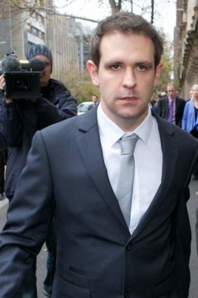 Grieving husband Tom Meagher leaves court after facing his wife's killer.