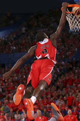 James Ennis of the Wildcats dunks the ball.
