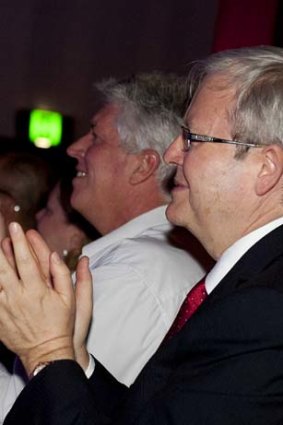 Kevin Rudd applauds Anna Bligh at the Queensland Labor Party's election launch.