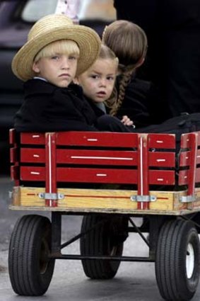 Amish children in a wagon.