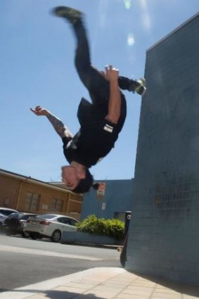 Justin Kilic flips a wall.