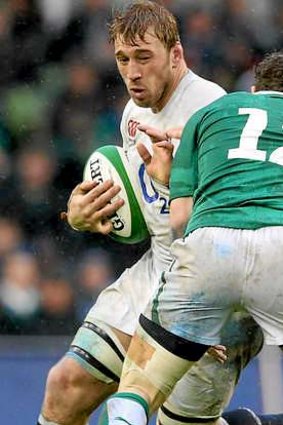 Gordon D'Arcy tackles England captain Chris Robshaw during the Six Nations clash in Dublin on Sunday.