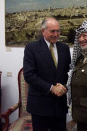 Missed his contact with  foreign leaders ... Yasser Arafat hosts the then Australian prime minister John Howard in Gaza.