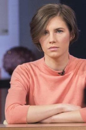 Amanda Knox sits alone before being interviewed on US television.