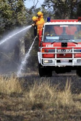 Firefighters put out a grass fire at Mount Duneed.