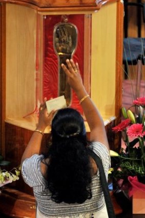 Relic: A rare relic of St Francis Xavier (his right hand) at the Goan community mass, Monash university, in 2012.