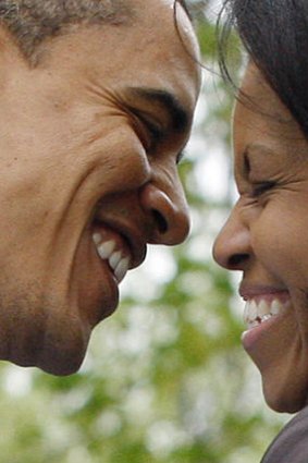 All smiles ... the Obamas share a moment at a picnic during the 2008 presidential primary season.