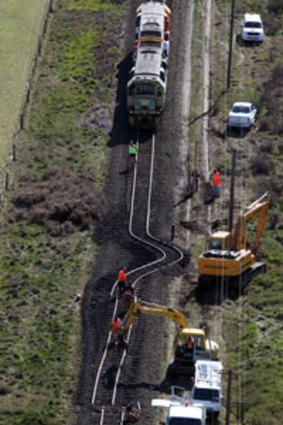Fault line ... this buckled railway shows the devastating power of the earthquake in Christchurch.