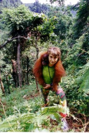 Jungle campaign  ...  Lucy Wisdom with an orang-utan in 1997.