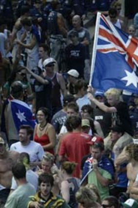 An angry crowd on the move at North Cronulla beach in 2005.