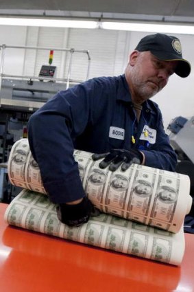 $US100 notes to be cut up at the US Bureau of Printing.