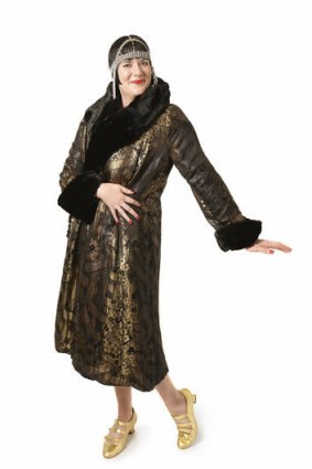 All that jazz … author and 1920s vintage-clothing collector Inger Sheil, wearing a 1920s gold lamé coat and headdress and reproduction shoes.