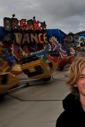 Father and son: Morgan and Michael Wittingslow at one of the fun rides on the Rye foreshore.