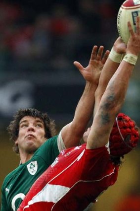 Alun Wyn Jones of Wales gets to the lineout ball ahead of Donncha O'Callaghan or Ireland.