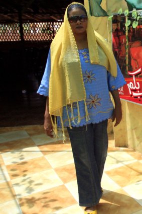 Lubna Hussein outside the Khartoum cafe where she was arrested for her way of dressing.