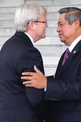 Regional solutions, not unilateral actions: Prime Minister Kevin Rudd is greeted by Indonesian President Susilo Bambang Yudhoyono.