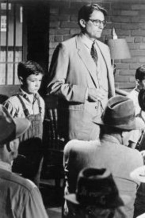 Gregory Peck stars as Atticus Finch and and Mary Badham as his daughter, Scout,  in the 1962  film <i>To Kill A Mockingbird</i>.