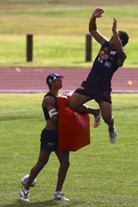 Up there, Izzy ... Minto-born Israel Folau practises going for the high ball.