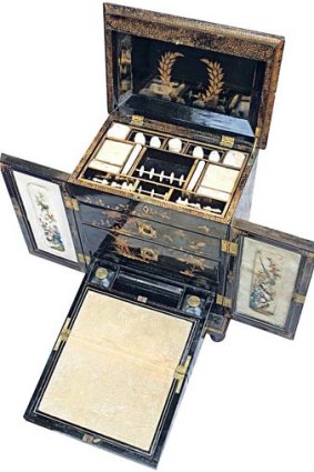 <b>$12,000 </b>This Cantonese exportware sewing or writing box is lacquered wood with painted gold figures. Dated about 1850, it contains the original ivory or bone instruments.