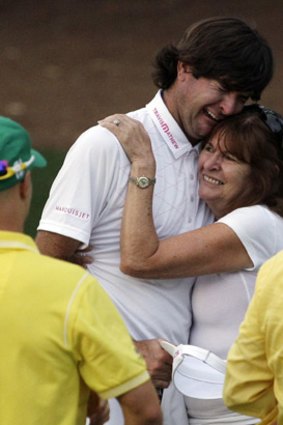 Crying fame: A teary Bubba Watson embraces his mum.
