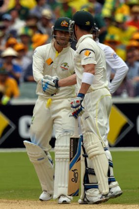 Michael Clarke (L) and Brad Haddin (R) celebrate their 6th wicket partnership.