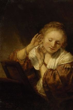 Rembrandt Harmensz. van Rijn, <i>Young woman trying on earrings</i>, 1657, oil on wood panel, 39.5 x 32.5cm, The State Hermitage Museum, St Petersburg. Acquired from the collection of the Comte de Baudouin, Paris, 1781.