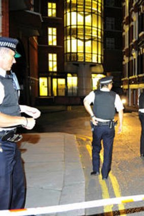 Police outside the Ecuadorian Embassy in London where Julian Assange is seeking political asylum. Photo: Paul Stewart