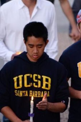 Students gather for a candlelight vigil on the University of California Santa Barbara campus.