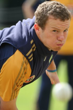 In pain ... A back problem will keep Peter Siddle off the pitch for up to five months.