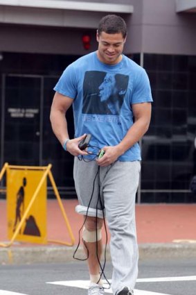 Strapping lad... Timana Tahu shows off the portable muscle stimulator on his knee and ankle injuries in Wollongong yesterday.