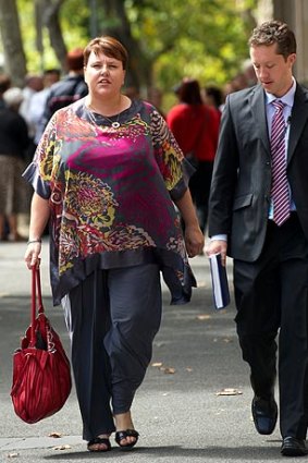 Peta Barnes (left), mother of Darcey Freeman, leaves court yesterday after testifying.