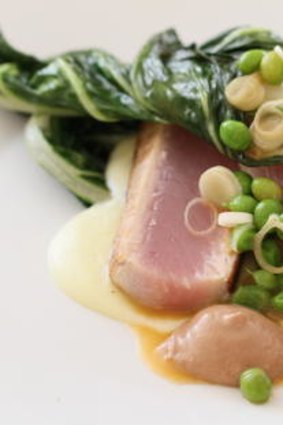 Bonito with spring peas, chard and anchovy paste.
