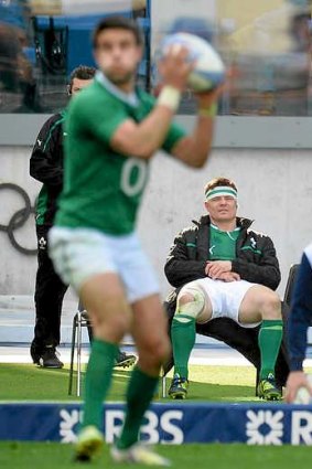 O'Driscoll sits on the sidelines after receiving a yellow card for stomping.