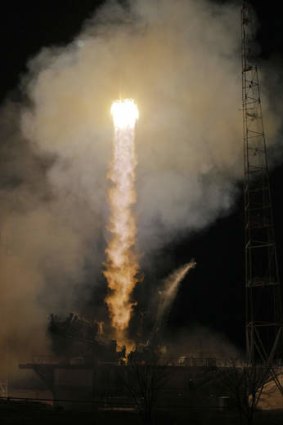 The Soyuz-FG rocket booster with Soyuz TMA-08M space ship carrying a new crew to the International Space Station, ISS, blasts off at the Russian leased Baikonur cosmodrome.