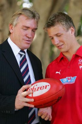 Father and son &#8230; Garry and Kieren Jack after Kieren was drafted to the Swans' rookie list in 2005.