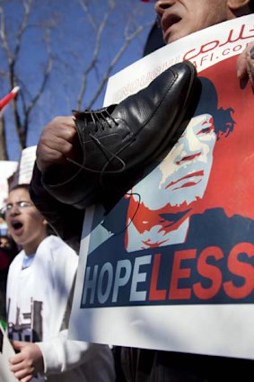 Demonstrators gather near the White House in Washington in a show of solidarity with the Libyan protestors.