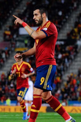 One step closer: Spain's Alvaro Negredo celebrates his goal.