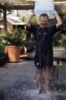 Education Minister Christopher Pyne takes part in the Ice Bucket Challenge. He was tagged by the Liberal MP for Hasluck, Ken Wyatt.