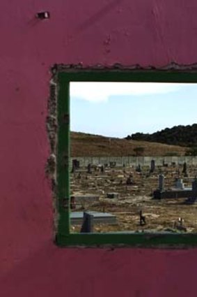High-risk group ... a graveyard in Cape Town, which holds many people who have died from AIDS; an estimated 5.6 million people are infected in South Africa.