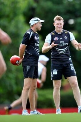 Lappin, left with coach Nathan Buckley, had responsibility for the Magpie forwards.