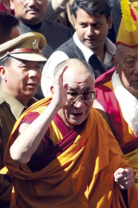 Return...the Dalai Lama arrives at a monastery in Tawang, north-eastern India
