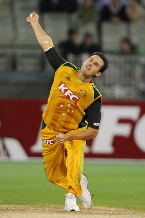 Speed merchant .. Shaun Tait roars in on Friday night. He took 3-13 in four overs.