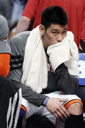 'Linterrupted' ... New York Knicks' guard Jeremy Lin sits on the bench during the first half of an NBA basketball game against the Chicago Bulls recently
