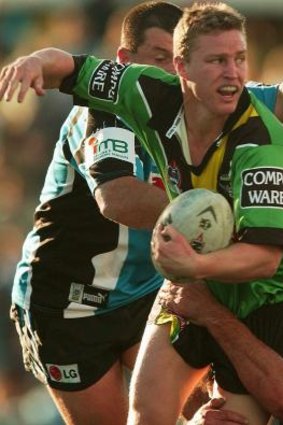 Ex-Raider Brett Finch, pictured taking on the Sharks in 2002, is another former Erindale College student.