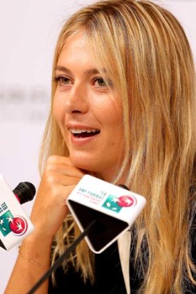 Tricky subject ... Maria Sharapova of Russia fields questions from the media.