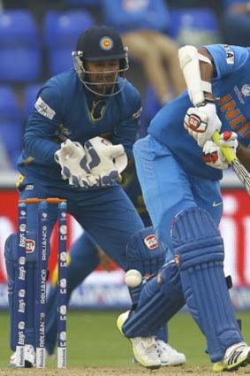 Head-turner: India's Shikhar Dhawan plays a ball to the leg side during the semi-final win against Sri Lanka.