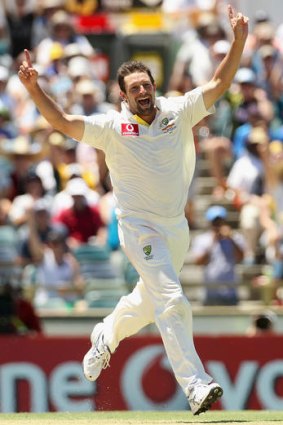 Happy hunter: Ben Hilfenhaus of Australia celebrates the wicket of Ishant Sharma.